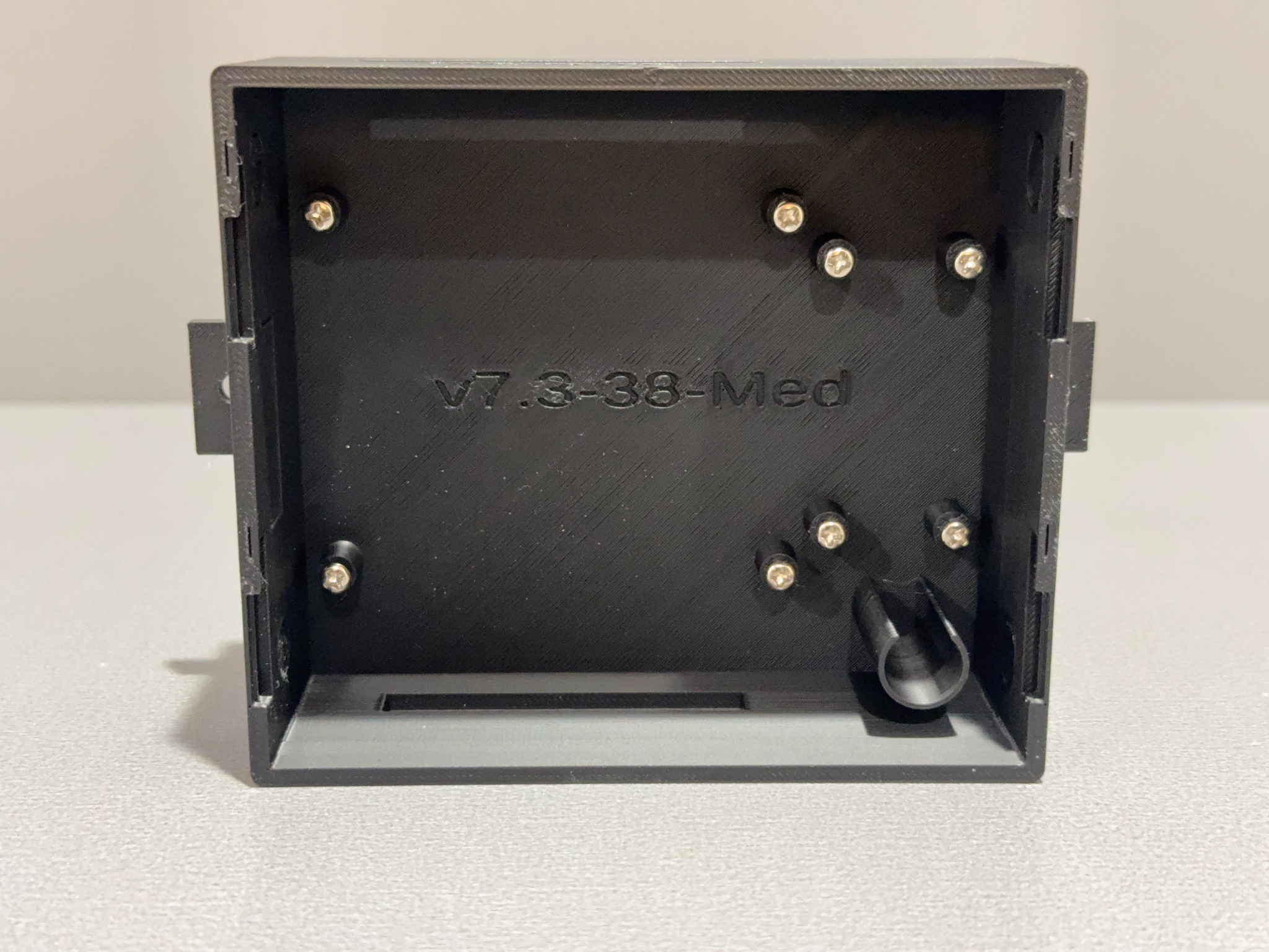 Ranger family enclosure empty interior showing installed screws and standoffs