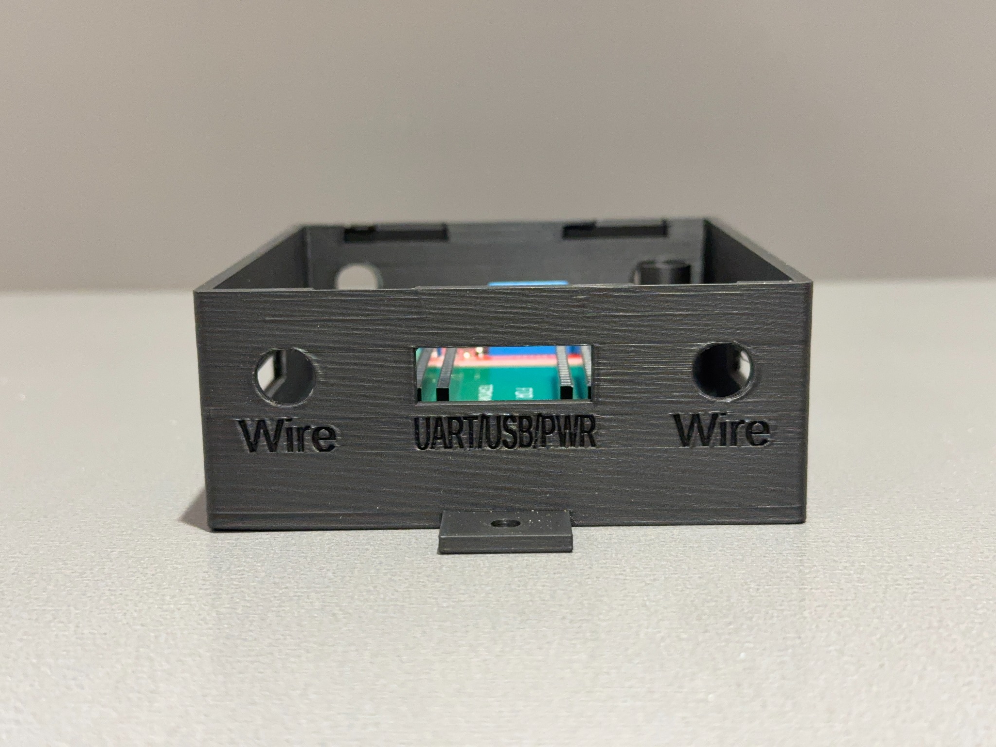 Front detail of the Ranger family enclosure showing UART USB power and wire openings